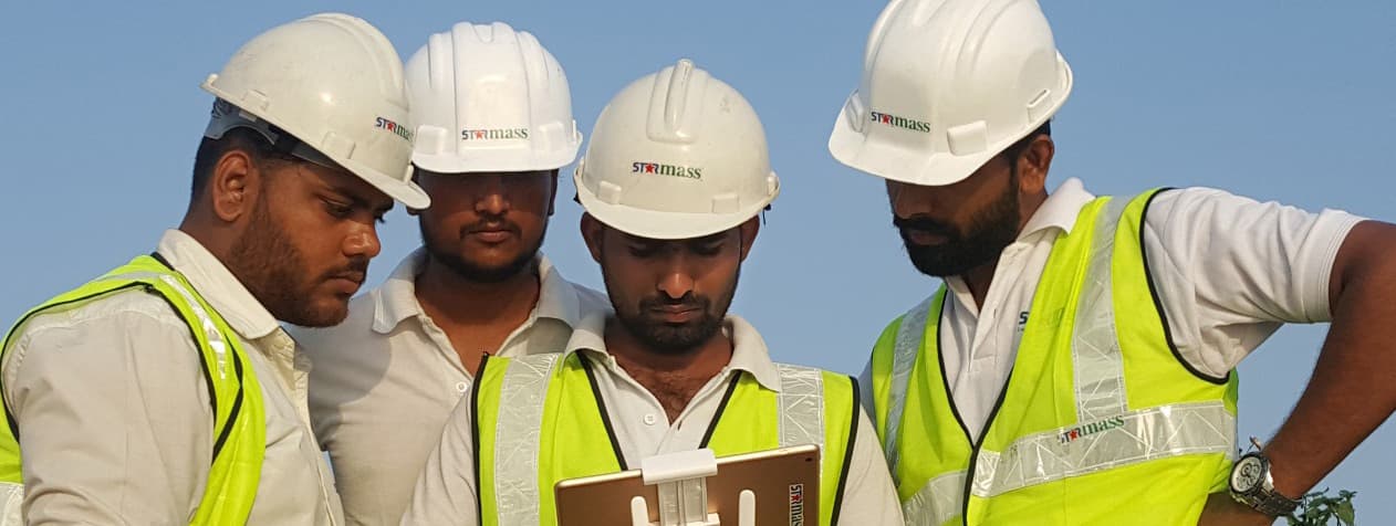 Starmass field crew reviewing data during a leak-detection and mapping operation.